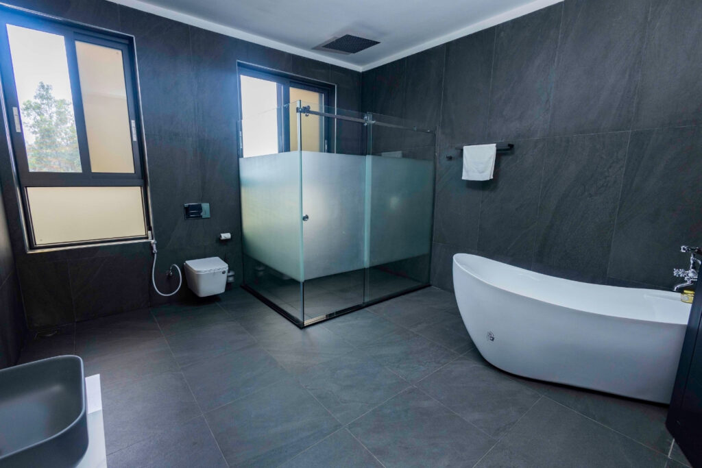 Zyphoria suite bed and seating at Mbarara holiday home rental