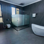 Zyphoria suite bed and seating at Mbarara holiday home rental