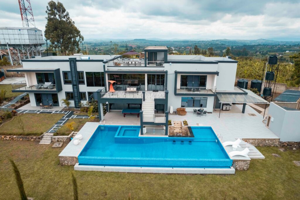 Aerial view of Utoppian Airbnb Mbarara showing the infinity pool and luxury holiday home