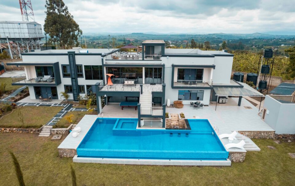 Aerial view of Utoppian Airbnb Mbarara showing the infinity pool and luxury holiday home